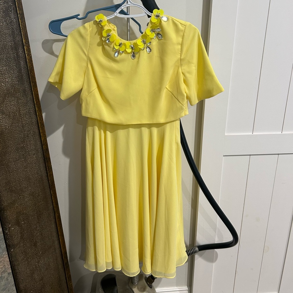 Stunning pale yellow dress with beautiful beaded neckline. Vintage vibes.